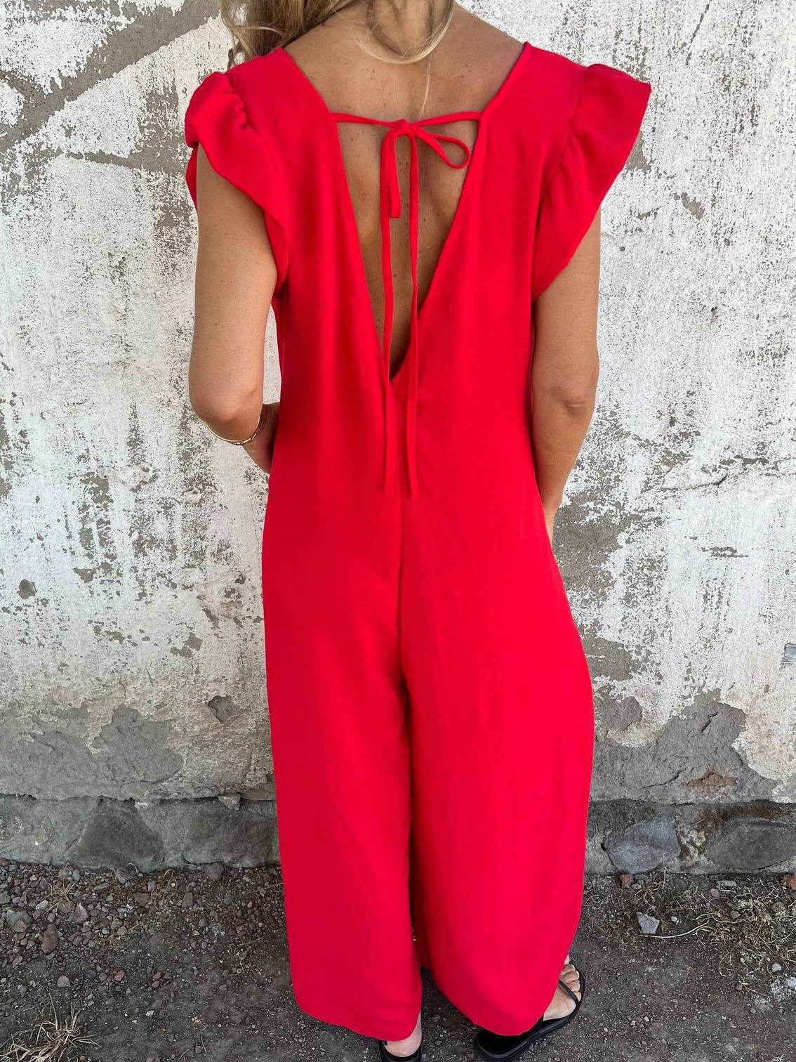 Leopard Print V Neck Jumpsuit With Front Pockets