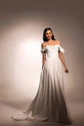 Chic A-Line Wedding Gown with Boat Neckline, Dropped Straps, and Button Embellishments