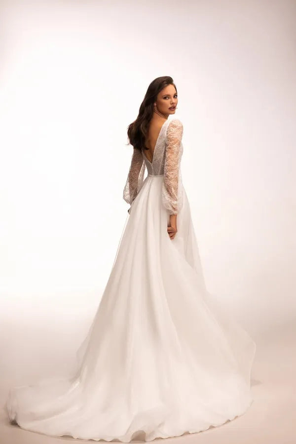Stunning  A-Line Wedding Gown with V-Neckline, Long Sleeves, and Sequin Embellishments