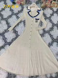Elegant Women's Slim Fit Knitted Dress Fashionable Polo Neck Short Sleeve Single breasted Design Split Knitted Mid length Dress Apricot long sleeves