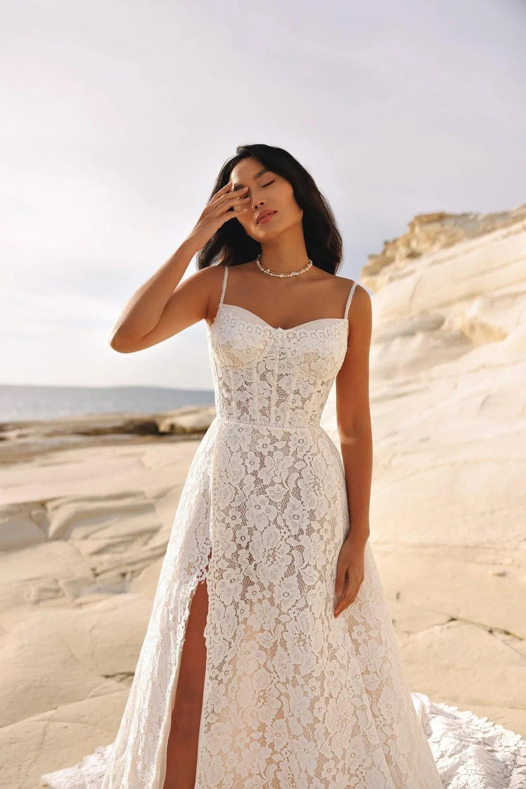Beautiful Spaghetti Straps Wedding Dress with Lace Embellishments and a Sophisticated Slit Perfect for Brides Dresses
